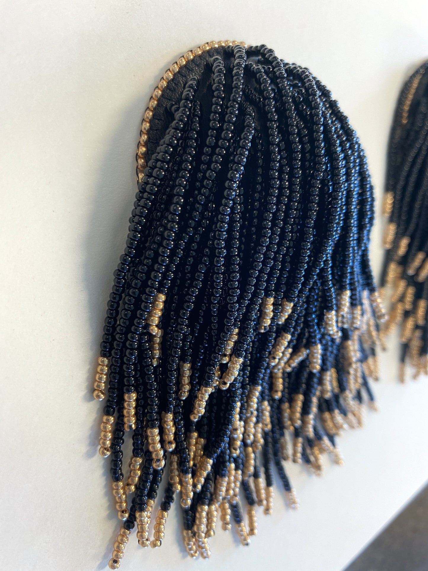 NDN Nips: Black and gold tassels