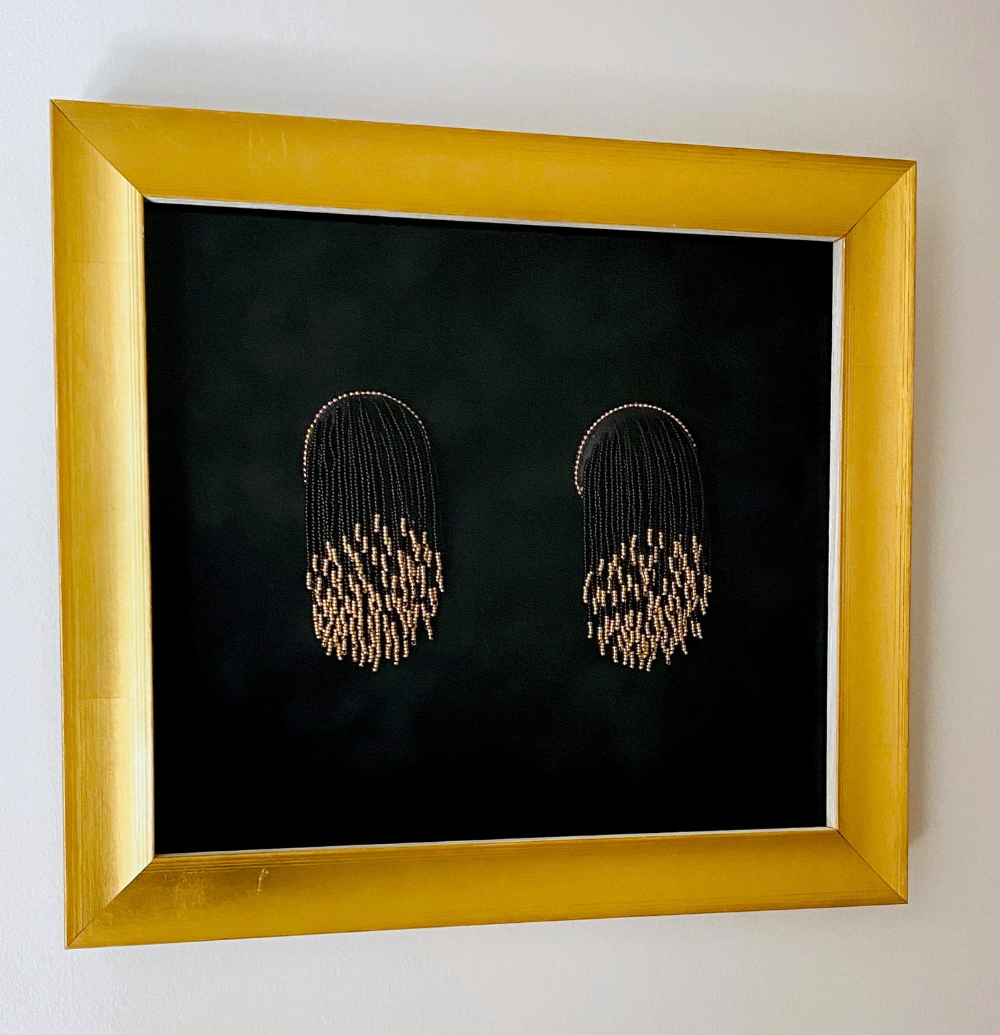 NDN Nips: Black and gold tassels