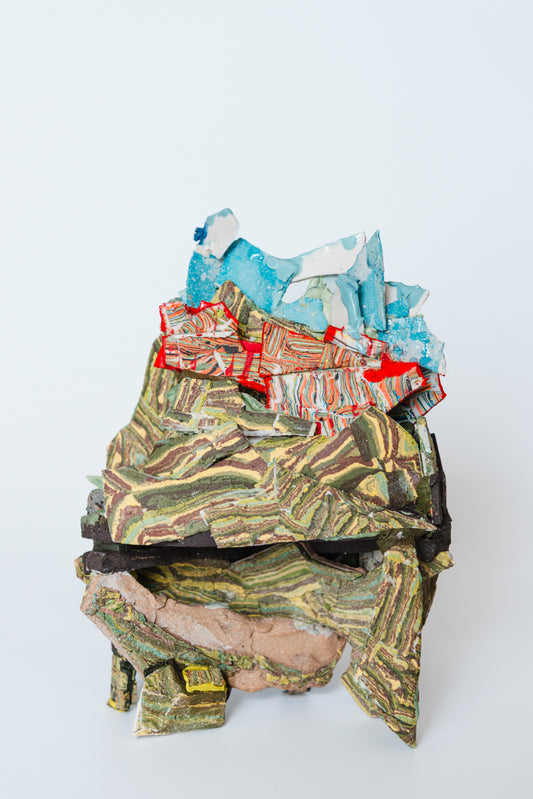 We climbed the moss and saw rusting metal, blood against grey sky. Occluded by green.